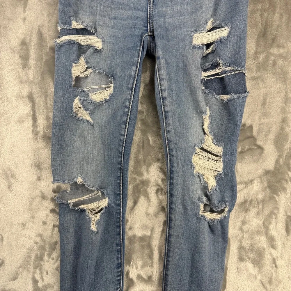 American Eagle Super Hi-Rise Jegging Distressed Blue Jeans Next Level Stretch 0